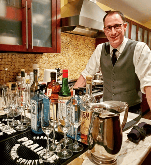 Jason, the host, standing at his virtual cocktail setup in his kitchen